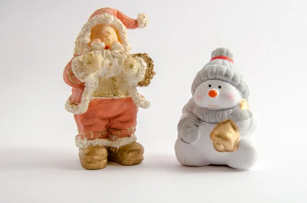 Ceramic Snowman and Statuette of Santa Claus (Christmas theme) — Stock Photo, Image