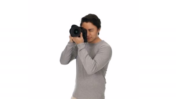 Handsome man with digital camera — Stock Video