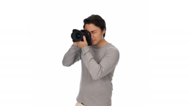 Handsome man with digital camera — Stock Video