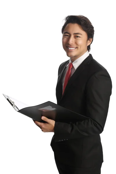 Attractive businessman with clipboard — Stock Photo, Image