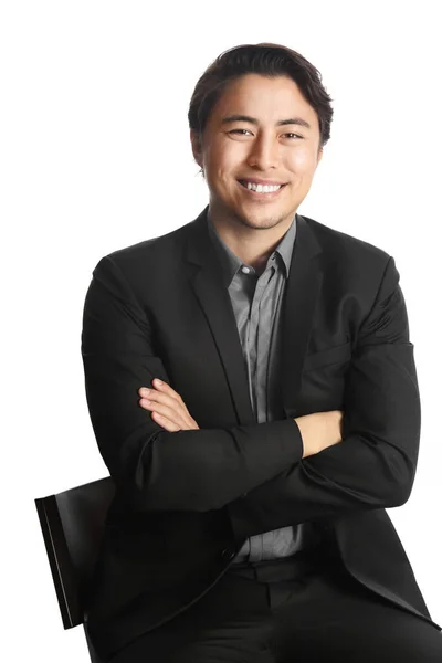 Smiling Asian Businessman Sitting Wearing Dark Suit Shirt Arms Crossed — Stock Photo, Image