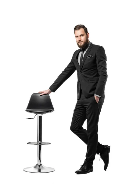 Attractive Businessman Wearing Black Suit Tie Standing White Background Leaning Stockafbeelding