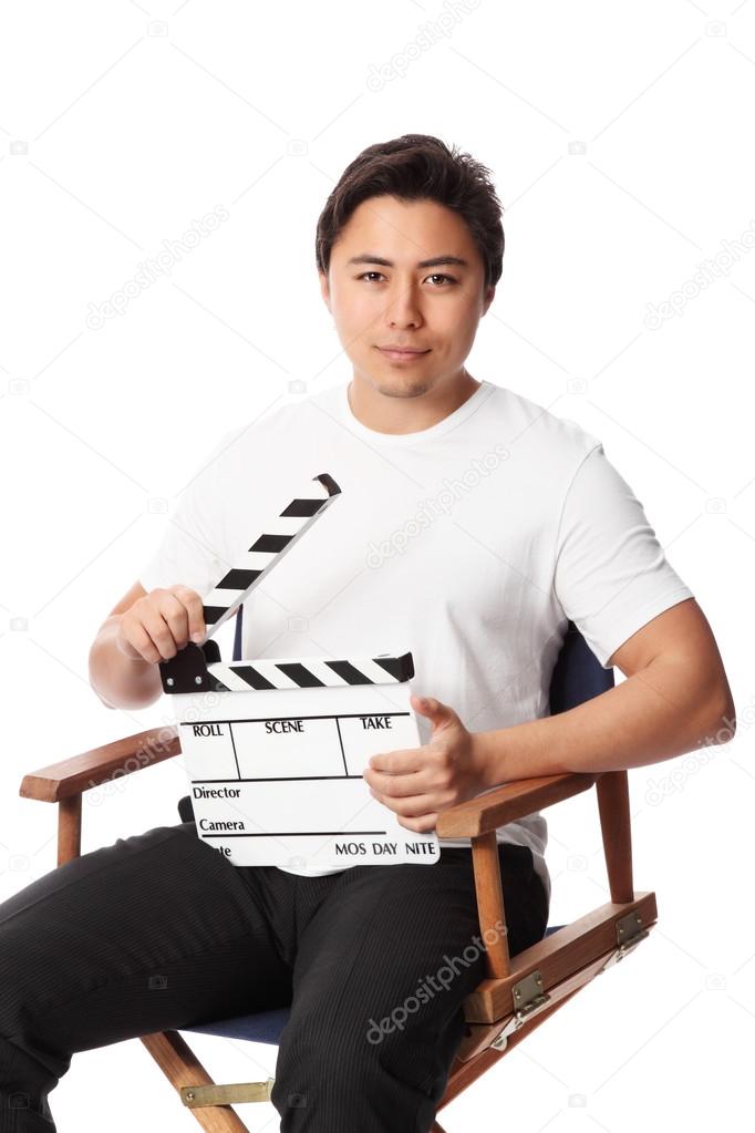 Man holding a film slate