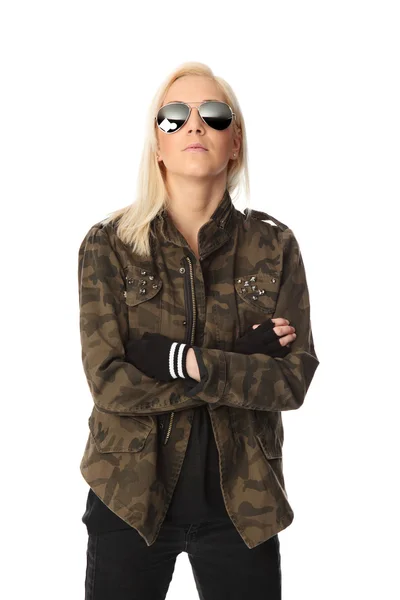 Cool looking rocker chic in a military jacket — Stock Photo, Image