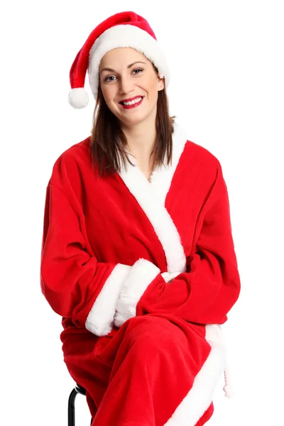 Beau Père Noël assis sur une chaise — Photo