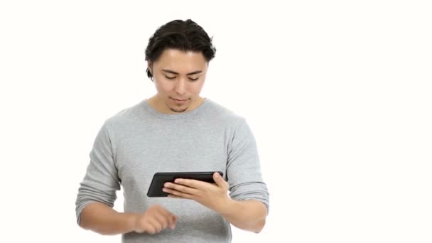 Smiling man with a digital tablet — Stock Video