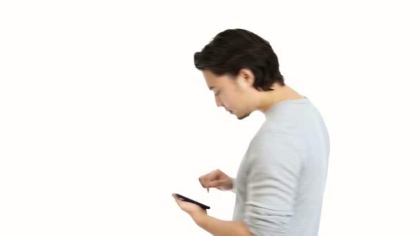 Walking man with reading tablet — Stock Video