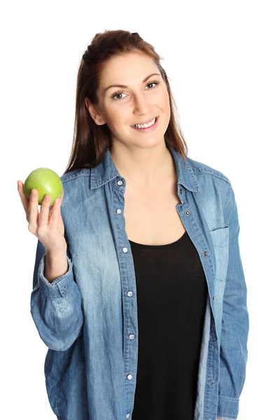 Attraktive Frau mit einem Apfel in der Hand — Stockfoto