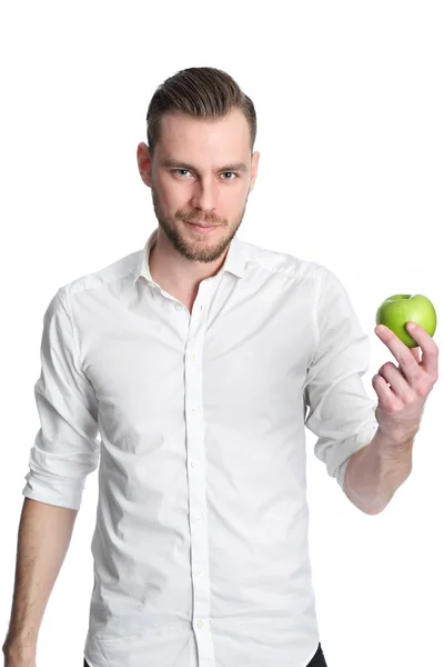 Mannen i hans 20s holding ett äpple — Stockfoto