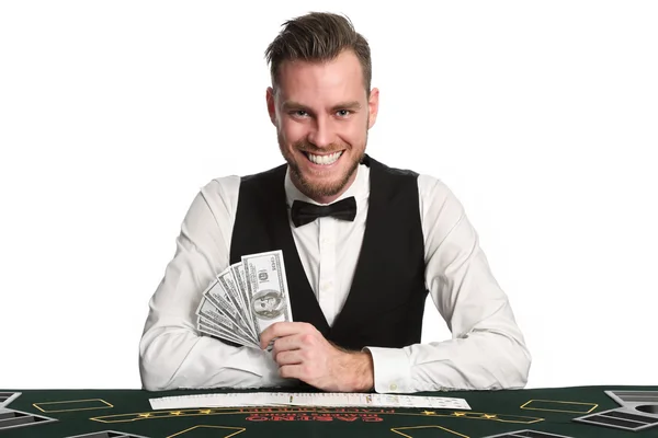 Smiling casino dealer — Stock Photo, Image