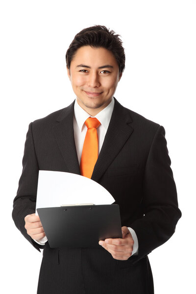 Businessman in orange tie and black suit