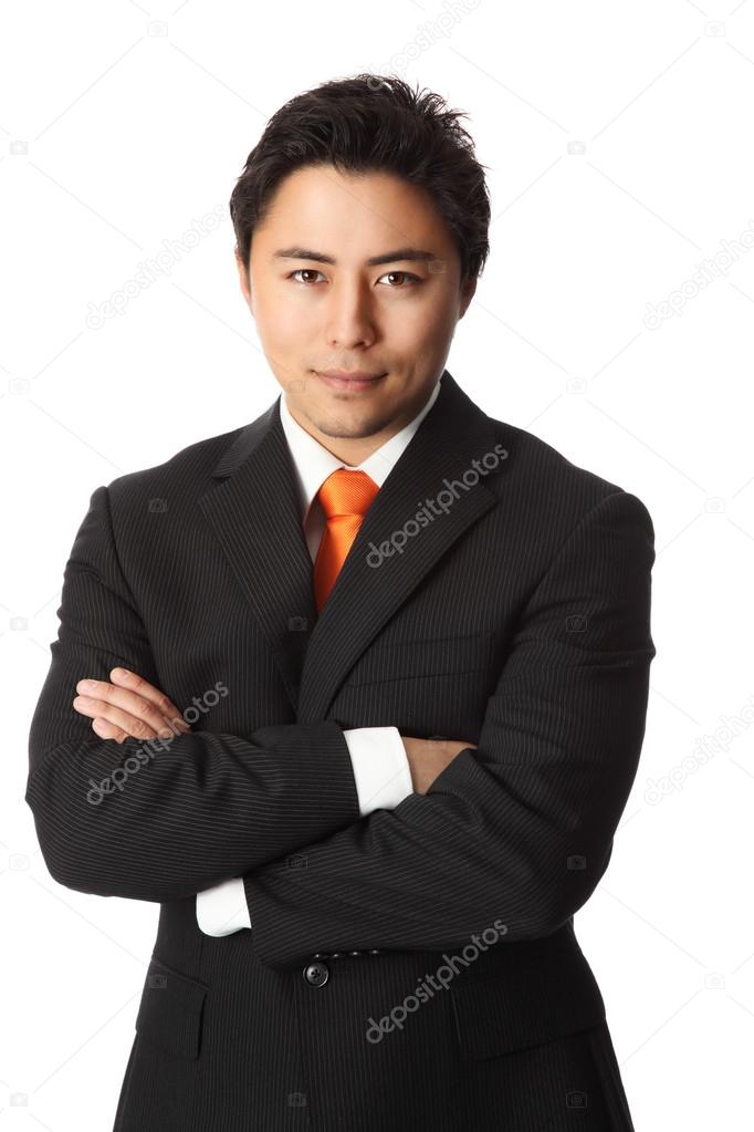 Businessman in orange tie and suit