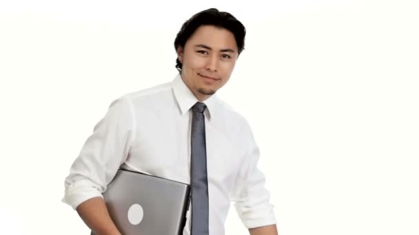 Businessman holding a laptop with white background — Stock Video