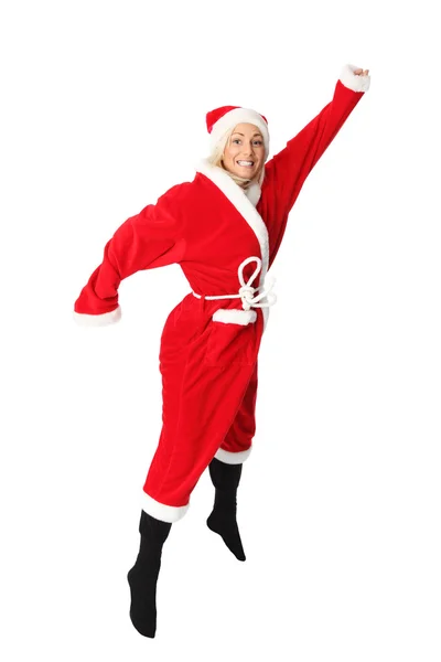 Mujer feliz en un traje de santa saltar — Foto de Stock