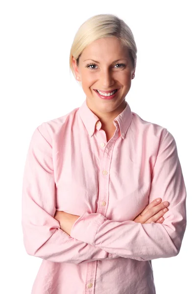 Attractive woman in a pink shirt and arms crossed — Stock Photo, Image