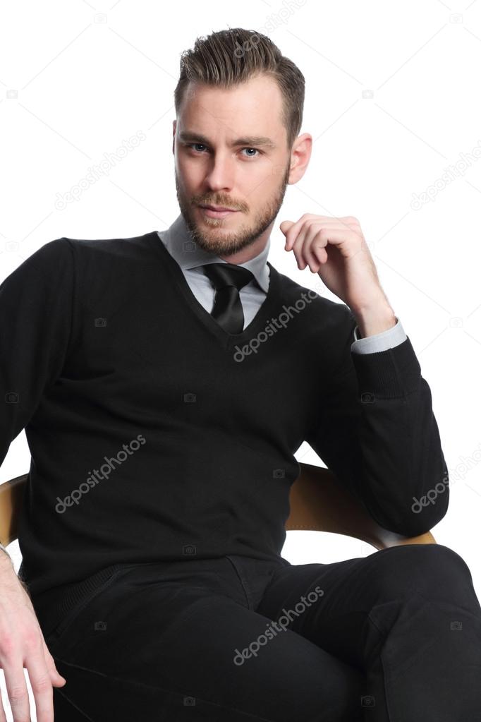 Relaxed businessman sitting down