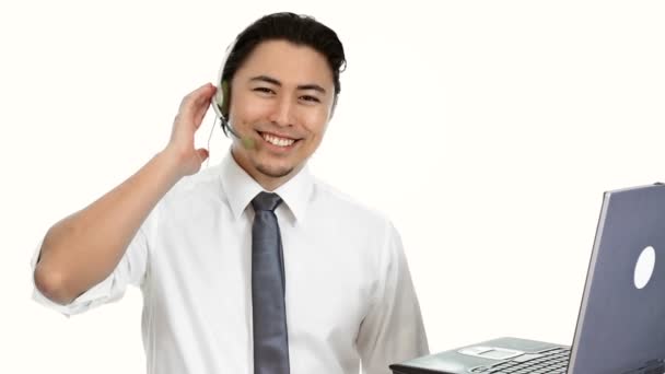 Businessman with headset and laptop — Stock Video