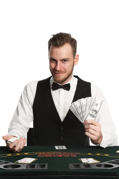 Smiling casino dealer — Stock Photo, Image