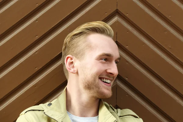 Successful young man in a jacket — Stock Photo, Image