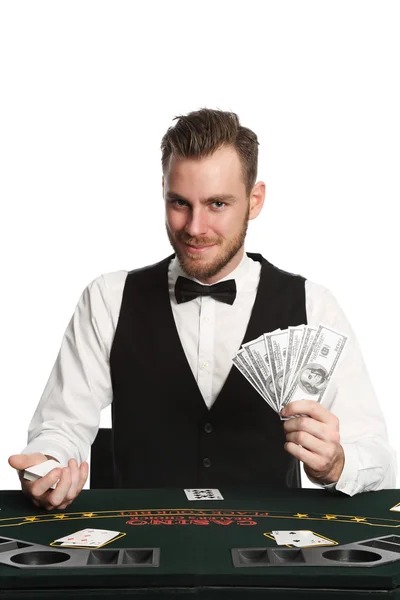 Distribuidor de casino sonriente Imágenes de stock libres de derechos