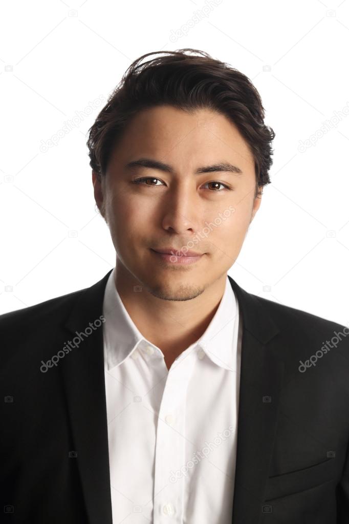 Handsome businessman looking at camera