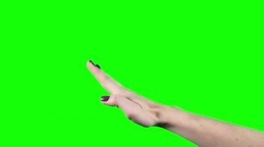 Beyaz kadın el, yeşil ekranda el sallıyor. Krom anahtarda parmak hareketleri