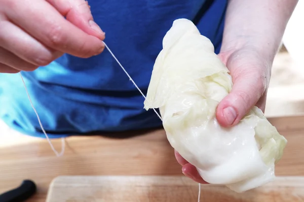 Preparing stuffed cabbage, Polish cuisine specialty. — Stock Photo, Image