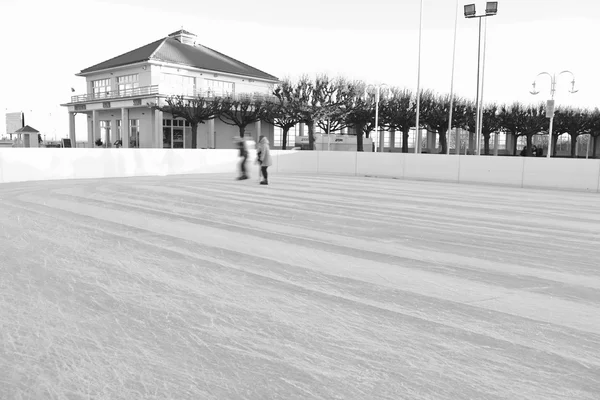 Motion blur people on the ice rink. — Stock Photo, Image