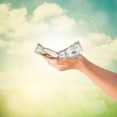 Bize dolar Not doğal arka plan ile holding eller