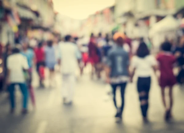 Blurred people walking on the street of old town — Stock Photo, Image