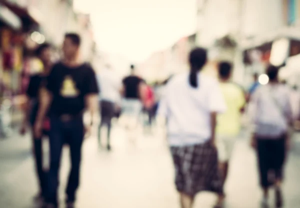 Blurred people walking on the street of old town — Stock Photo, Image