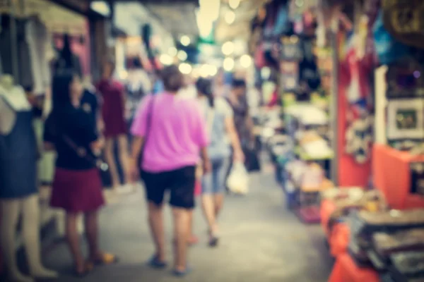 Blurred people in the market — Stock Photo, Image