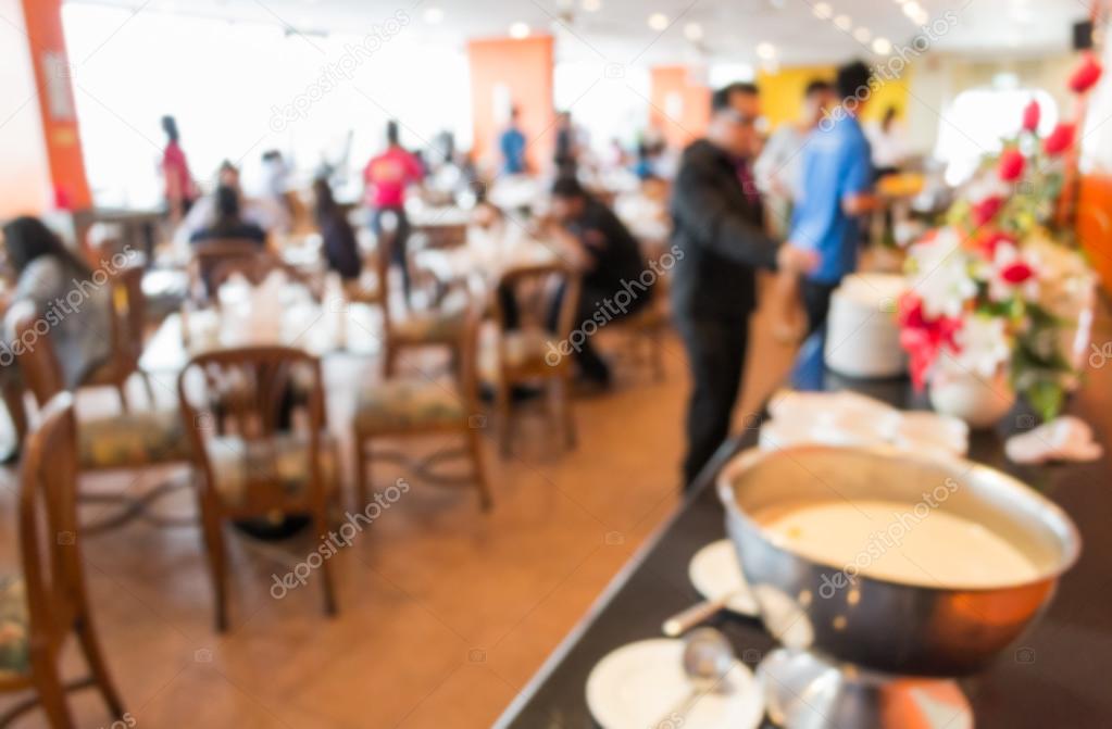Blurred people in the cafeteria 
