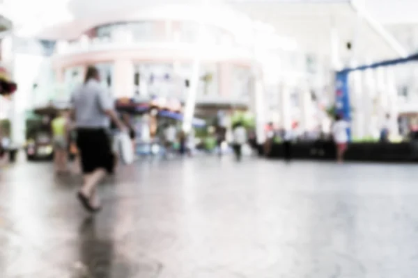 Gente borrosa caminando en el centro comercial —  Fotos de Stock