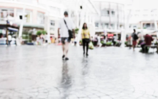 Blurred people in shopping center — Stock Photo, Image