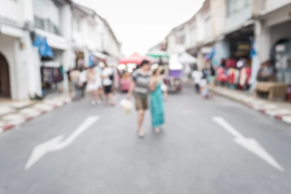 Blurred people walking on the street — Stock Photo, Image
