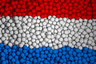 Many small colorful balls that form national flag of Netherlands