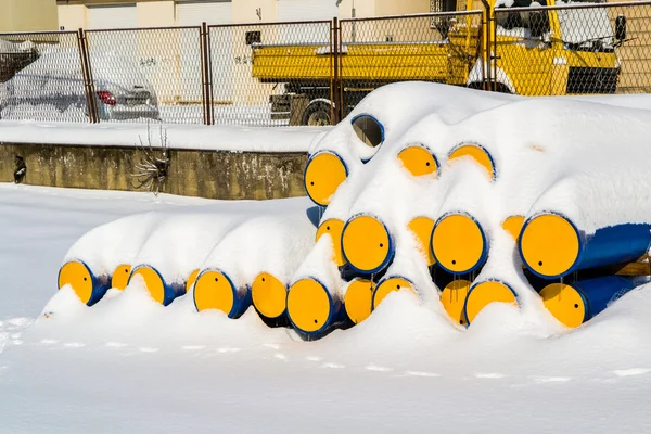 Industrial piping covered with snow — Stock Photo, Image