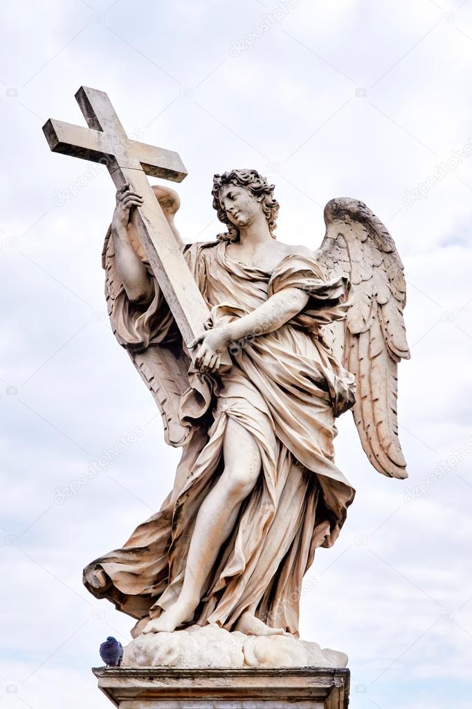 Angel with the Cross statue on Ponte Sant Angelo bridge in Rome, Italy