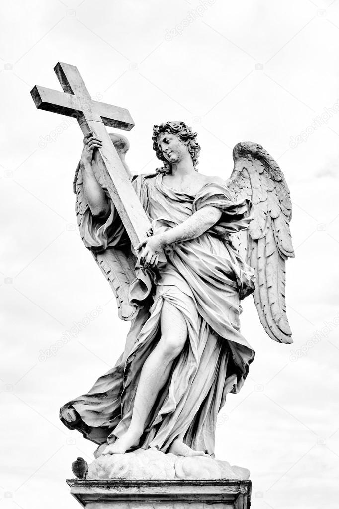 Angel with the Cross statue on Ponte Sant Angelo bridge in Rome, Italy