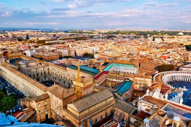 Panoramic view of city of Rome and the Vatican museums from the top of the dome of the basilica of St. Peter clipart