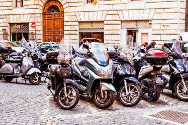 ROME, ITALY - OCTOBER 29: Citizens most commonly use motorcycles for everyday transportation in Rome, Italy on October 29, 2014.