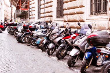 ROME, ITALY - OCTOBER 29: Citizens most commonly use motorcycles for everyday transportation in Rome, Italy on October 29, 2014.