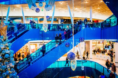 MALMO, SWEDEN - JANUARY 2, 2015: Emporia, modern shopping center, is visited by many people during Christmas season in Malmo, Sweden. clipart