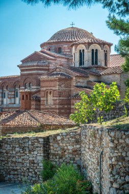 Hosios Loukas (Greek:  ) is a historic walled monastery situated near the town of Distomo, in Boeotia, Greece.