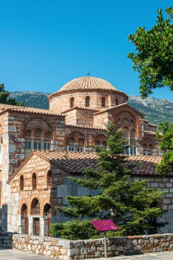Hosios Loukas (Greek:  ) is a historic walled monastery situated near the town of Distomo, in Boeotia, Greece.