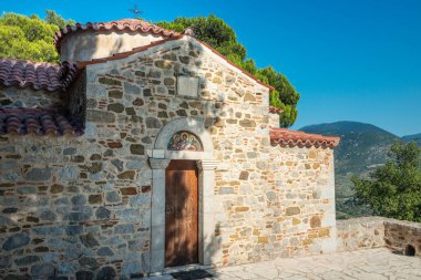 Hosios Loukas (Greek:  ) is a historic walled monastery situated near the town of Distomo, in Boeotia, Greece