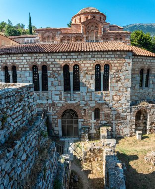Hosios Loukas (Greek:  ) is a historic walled monastery situated near the town of Distomo, in Boeotia, Greece