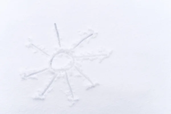 Karların Üzerine Çizilmiş Güneş Sembolü — Stok fotoğraf