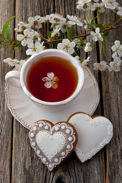 Composición con taza de té y galletas —  Fotos de Stock